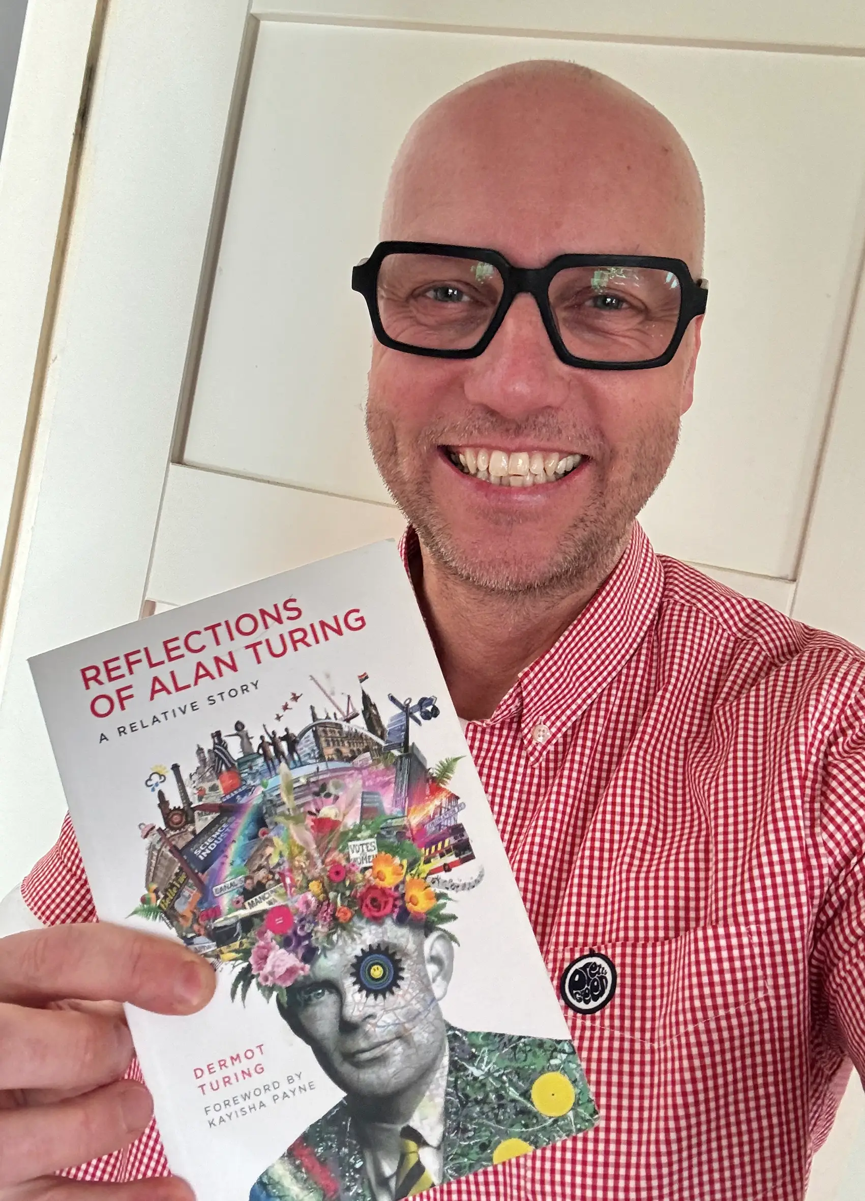 Artist Justin Eagleton and the cover art he created for the book Reflections of Alan Turing.