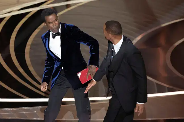Will Smith slapping Chris Rock.