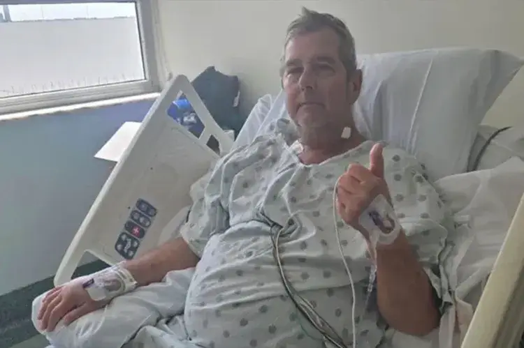 The dad has started an unlikely recovery after contracting the 'flesh-eating disease' (GoFundMe)