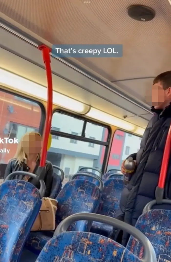 Despite her clearly wanting to be left alone, the man keep harassing the woman.