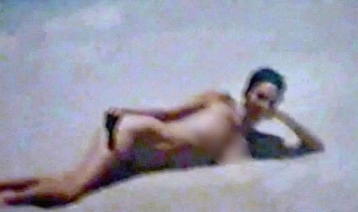 One photo showed her nude on the beach. (Palm Beach County State Attorney's Office)