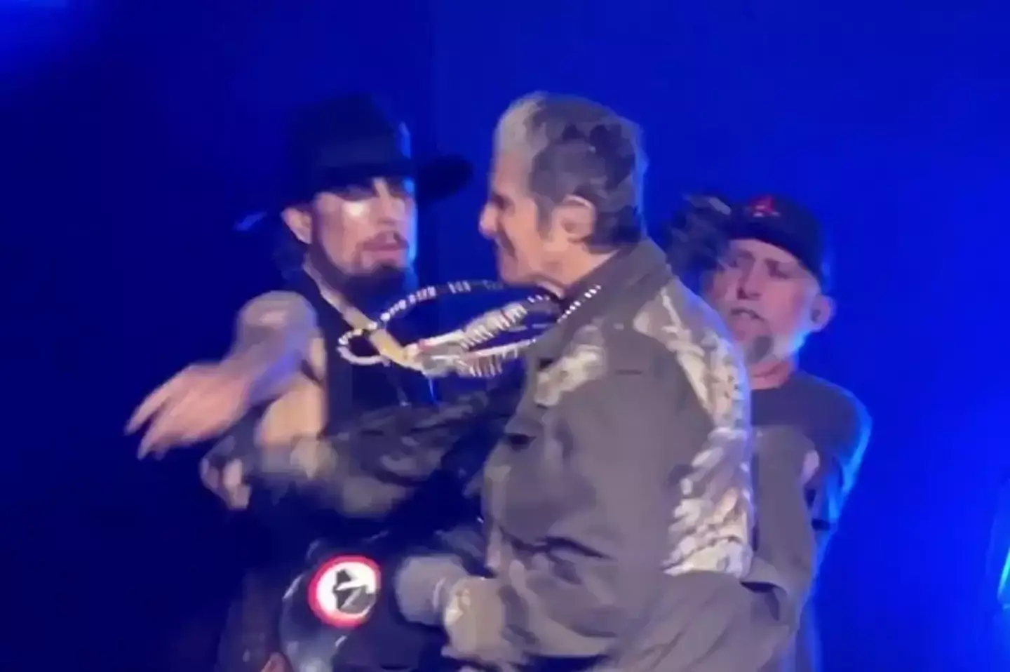 The bandmates had a bust-up on and back stage (YouTube/WatchThisOne)