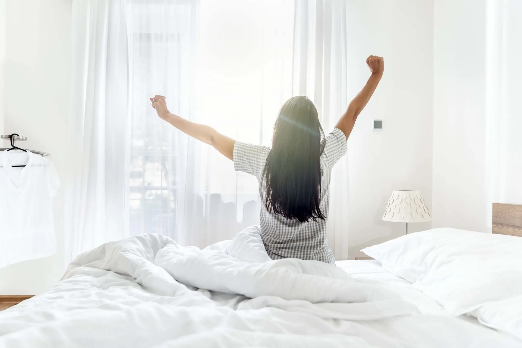 Don't stay in bed, no matter how tempting. (Getty stock photo)