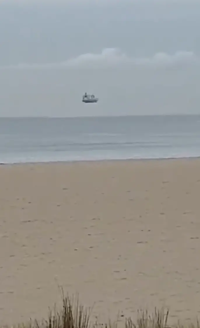 Monika Shaffner saw a 'floating' boat in the distance. (FB/Monika Schaffner/ViralHog)