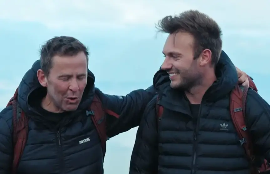 Mills and his husband on Race Across the World (BBC)