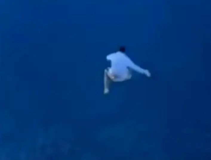 Nick Naydev jumped from the 11th deck of a large cruise ship. (Inside Edition)