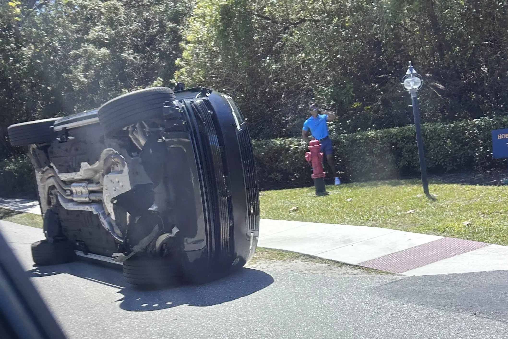 The overturned SUV at the scene of the crash (AP/PA Images)