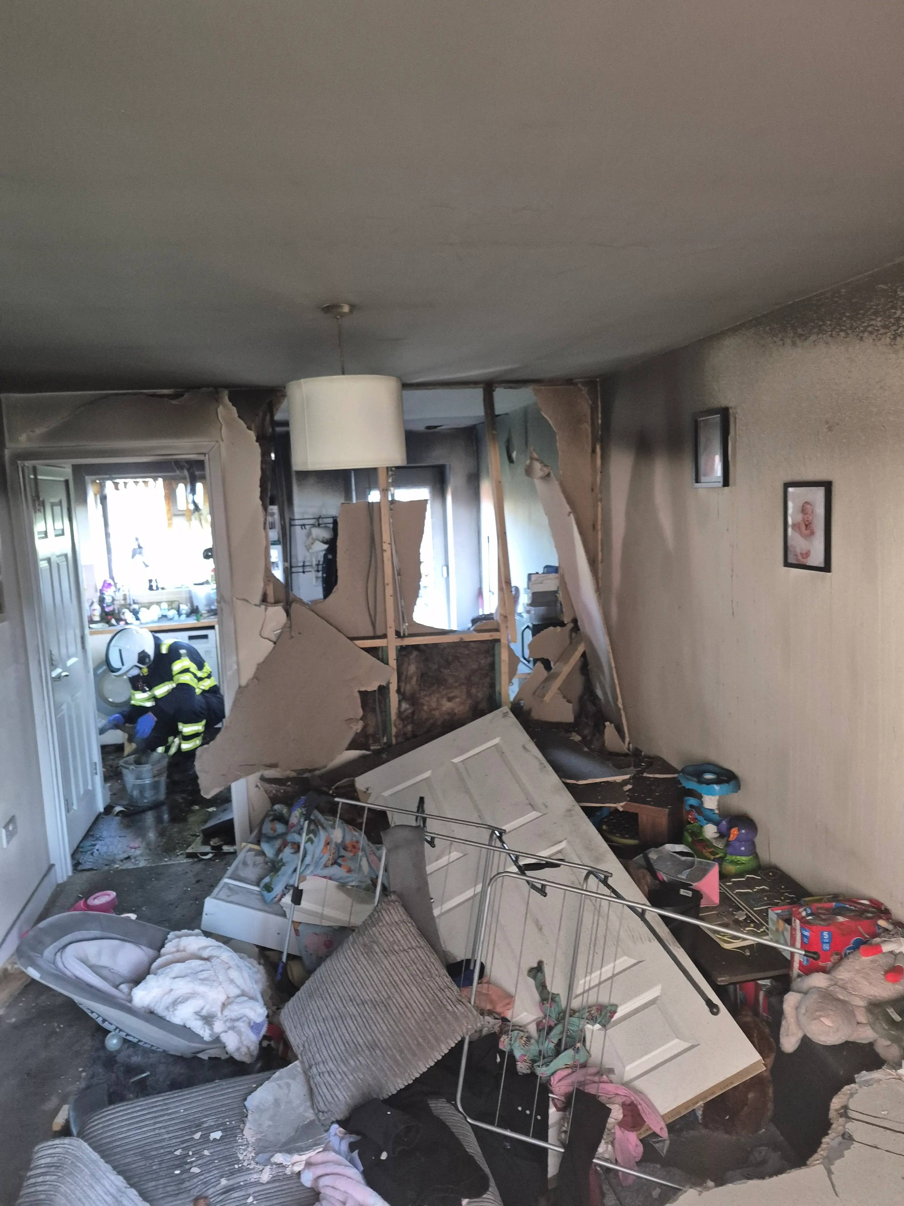 The 23-year-old's home was devastated by the blaze and subsequent water damage (SWNS)