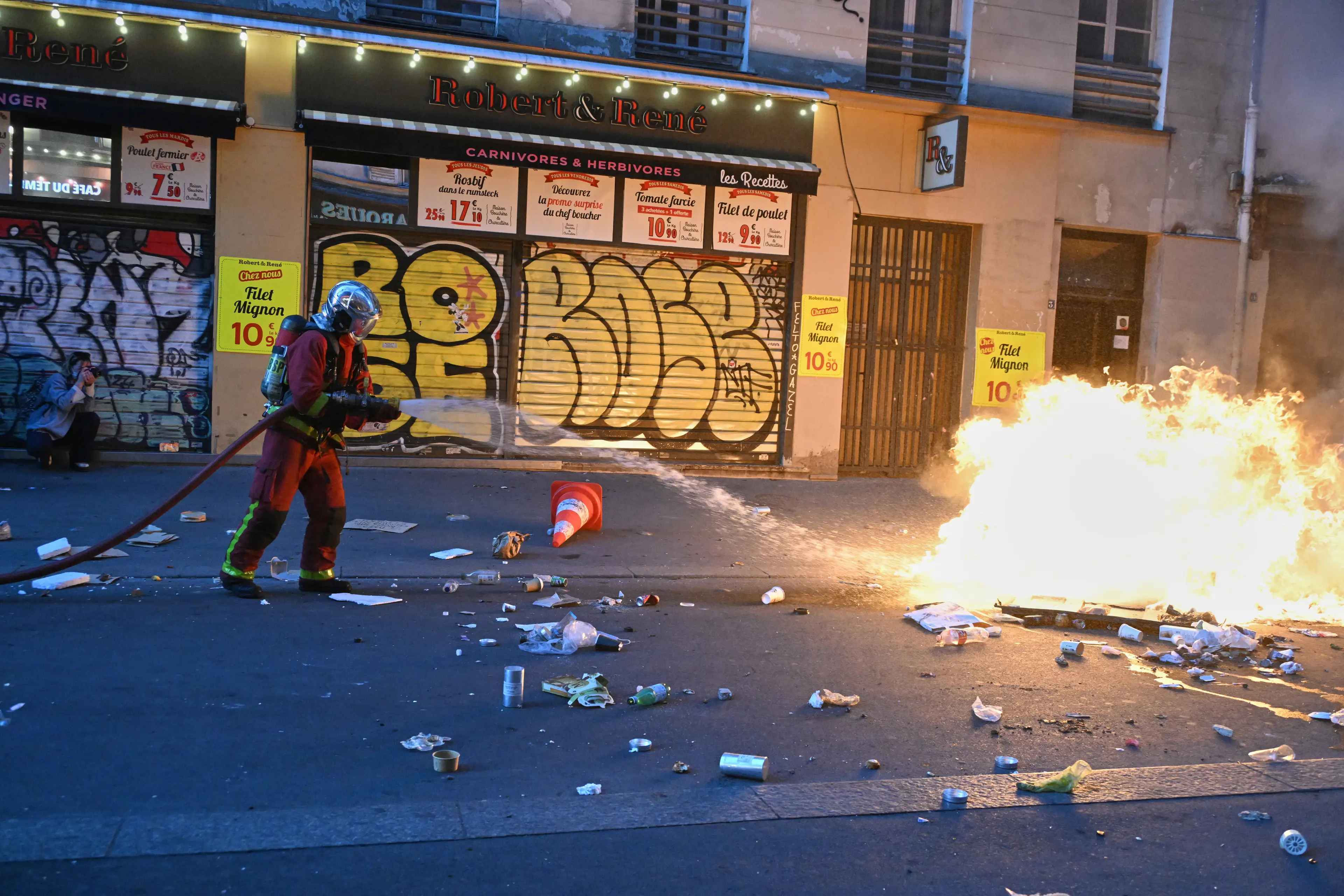 An estimated 1,500 shops and businesses were looted and destroyed (AP/Emma Da Silva)