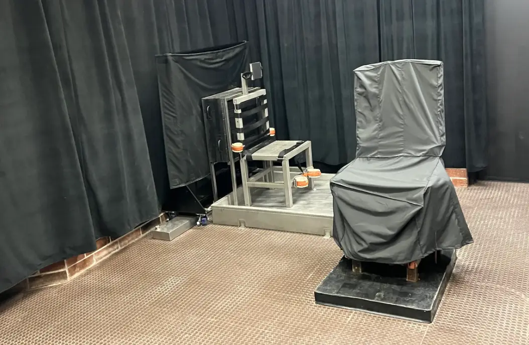 South Carolina's firing squad chair behind the covered electric chair. (South Carolina Department of Corrections)