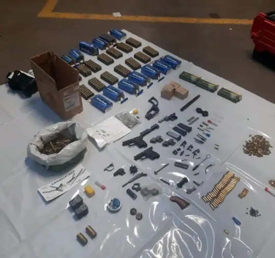 The NCA called the unit a 'suspected firearms conversion factory'.