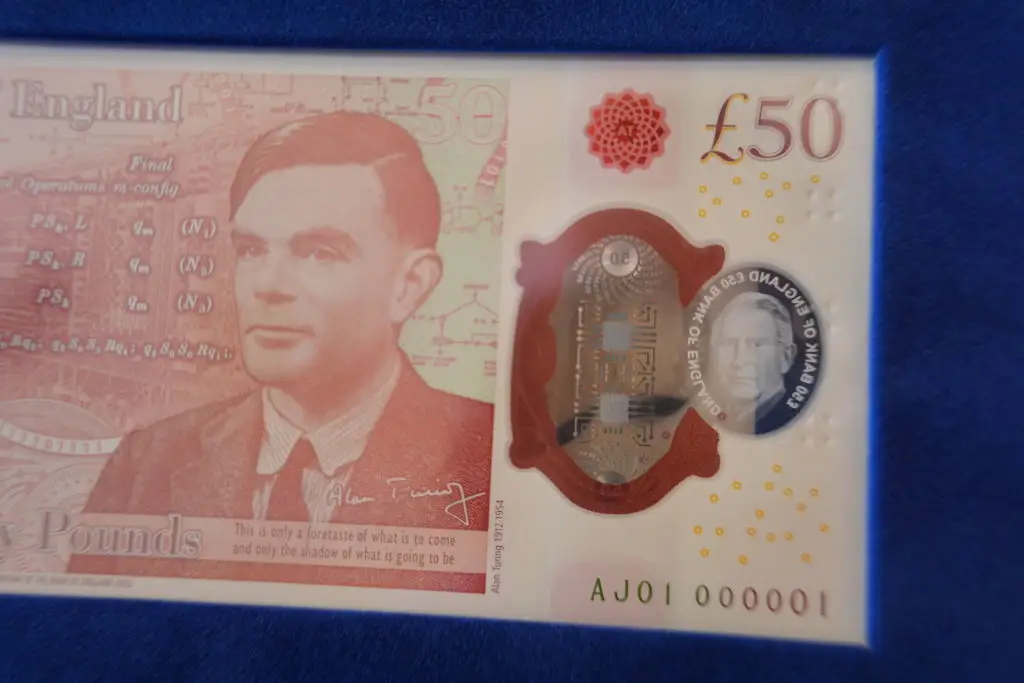 King Charles was presented with the first printed £50 note, spot the AJ 01 000001 serial number in the corner. (Yui Mok - WPA Pool/Getty Images)