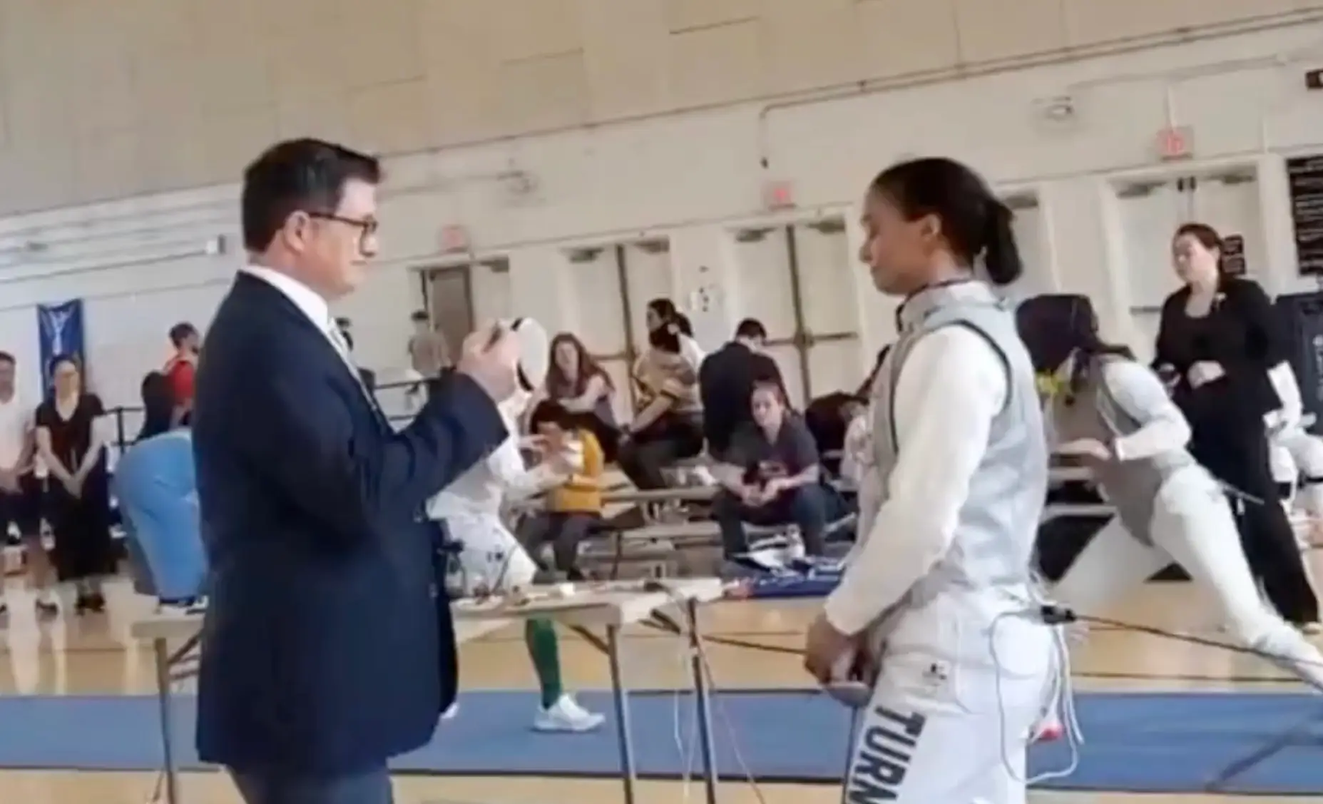 The fencer, 31, was shown a black card by the referee in wake of her protest (X/@icons_women)