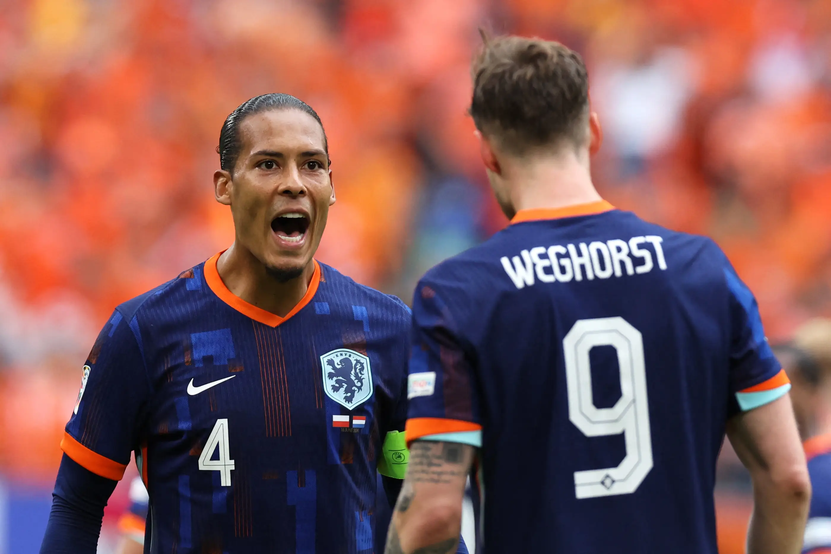 Virgil van Dijk celebrates with Wout Weghorst. Image: Getty 
