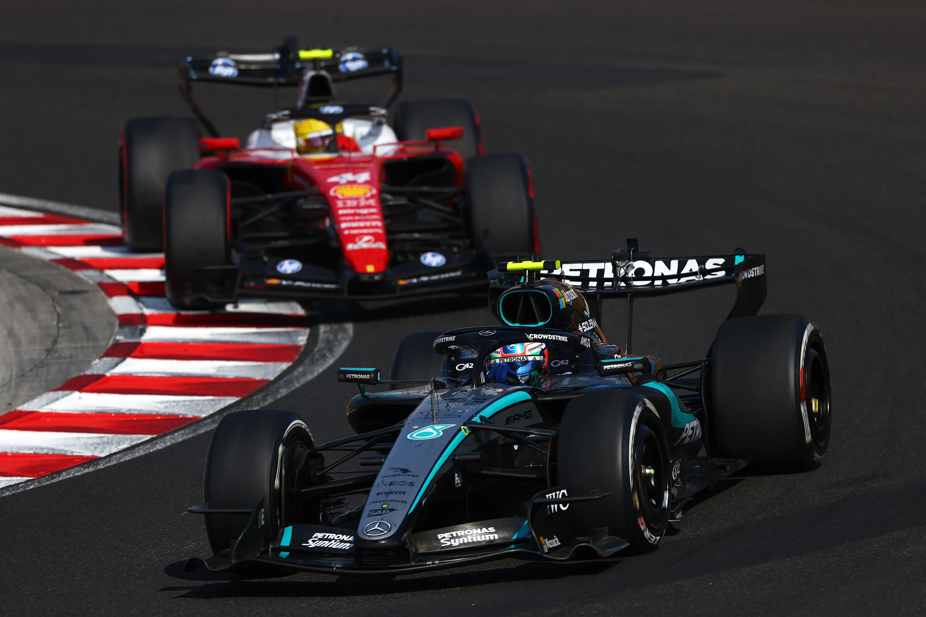 Andrea Kimi Antonelli of Italy driving the (12) Mercedes AMG Petronas F1 Team W17 leads Lewis Hamilton of Great Britain driving the (44) Scuderia Ferrari SF-26 (Getty Images)