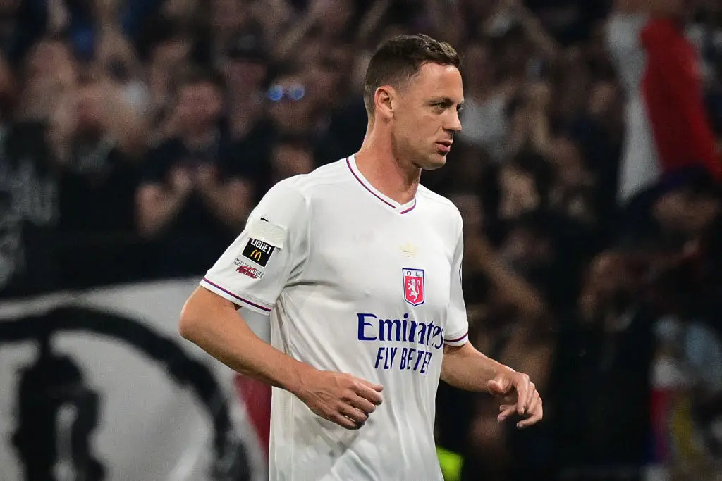 Nemanja Matic covered the anti-homophobia badge on his Lyon kit during the Ligue 1 match against Angers. (Image: Getty)