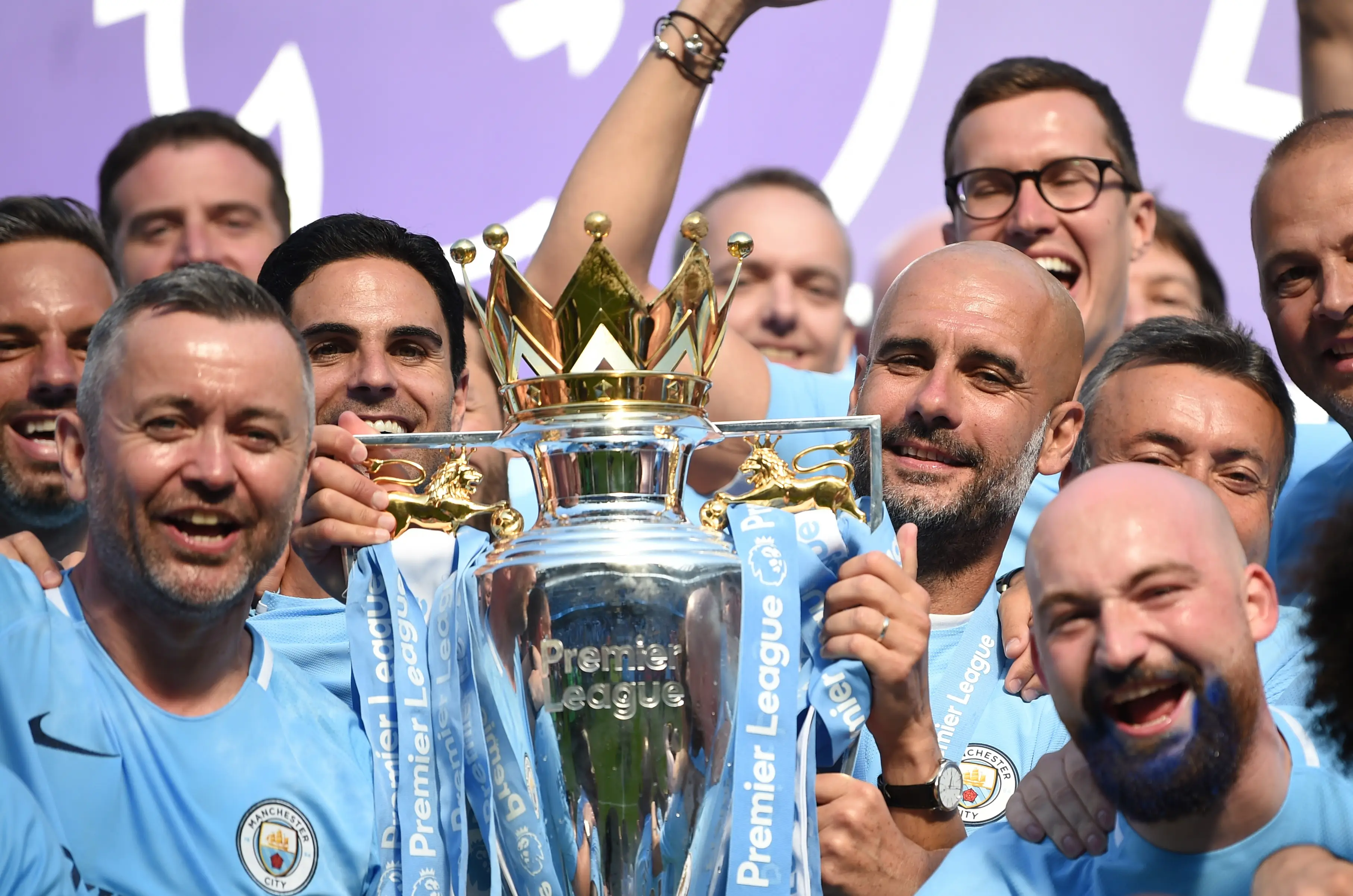 Guardiola lifts Premier League title. Image credit: Getty