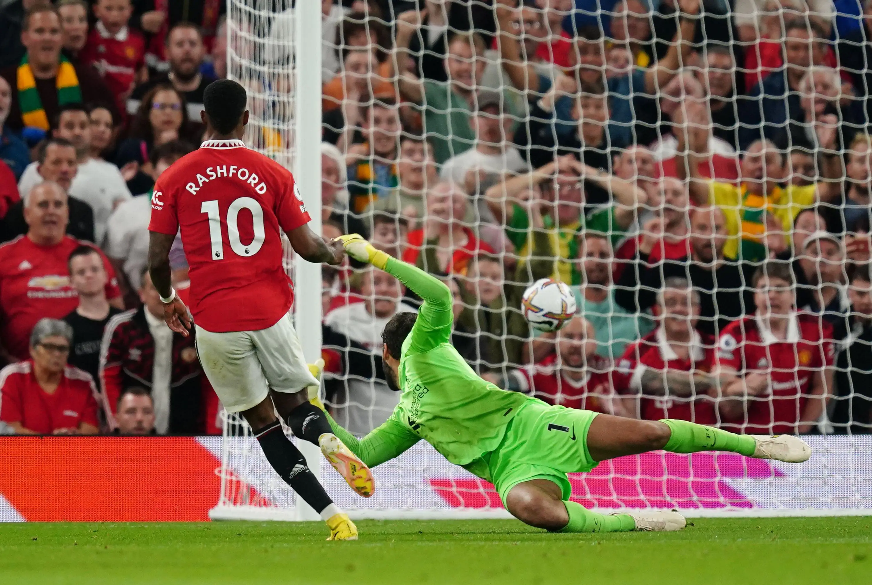 Marcus Rashford scoring United's second goal against Liverpool. (Alamy)