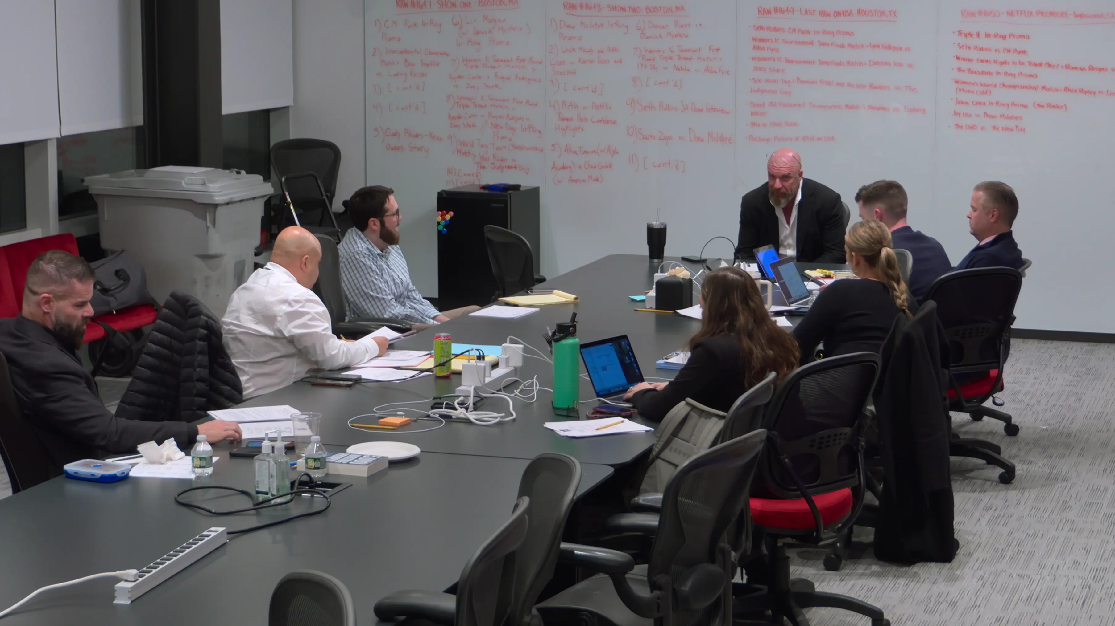 WWE Unreal viewers gain access to Triple H's meetings with his writing team. Image: Netflix