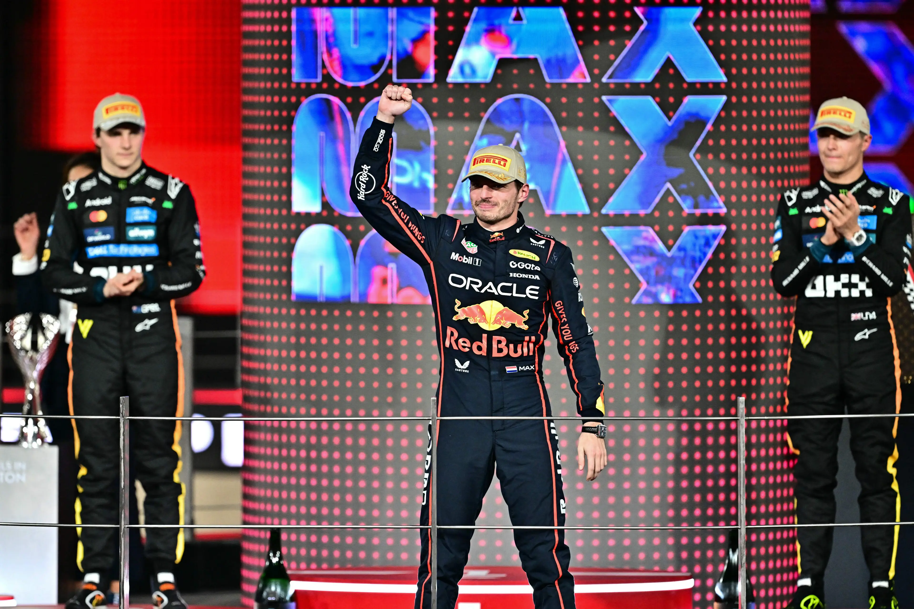 Max Verstappen, Oscar Piastri and Lando Norris on the podium at the Abu Dhabi Grand Prix. Image: Getty 