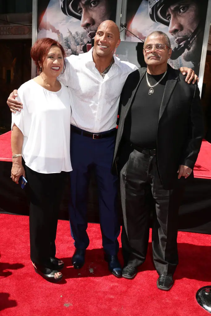 The Rock and his parents in 2015 (Credit:Getty)