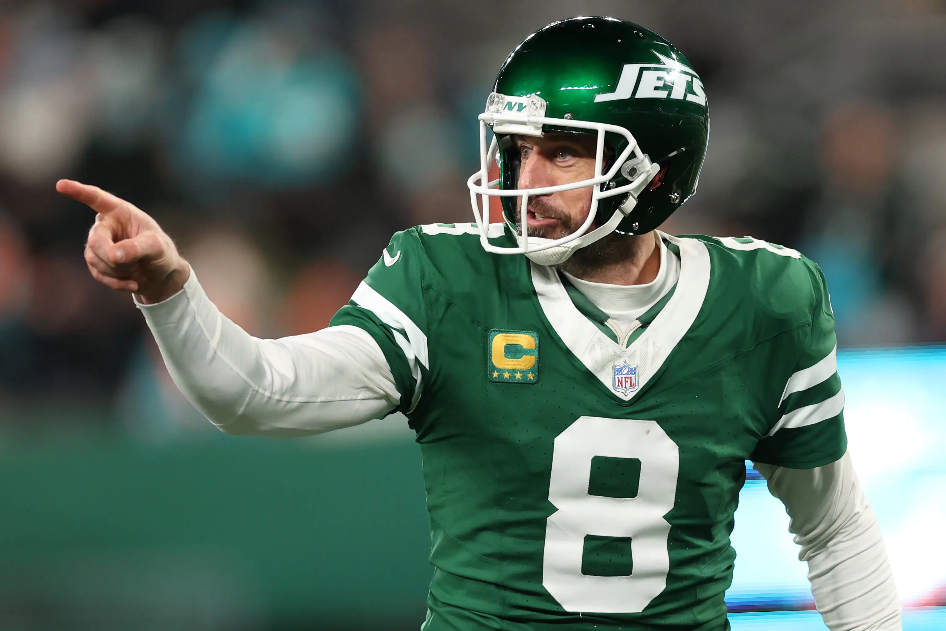 Aaron Rodgers playing for the New York Jets.