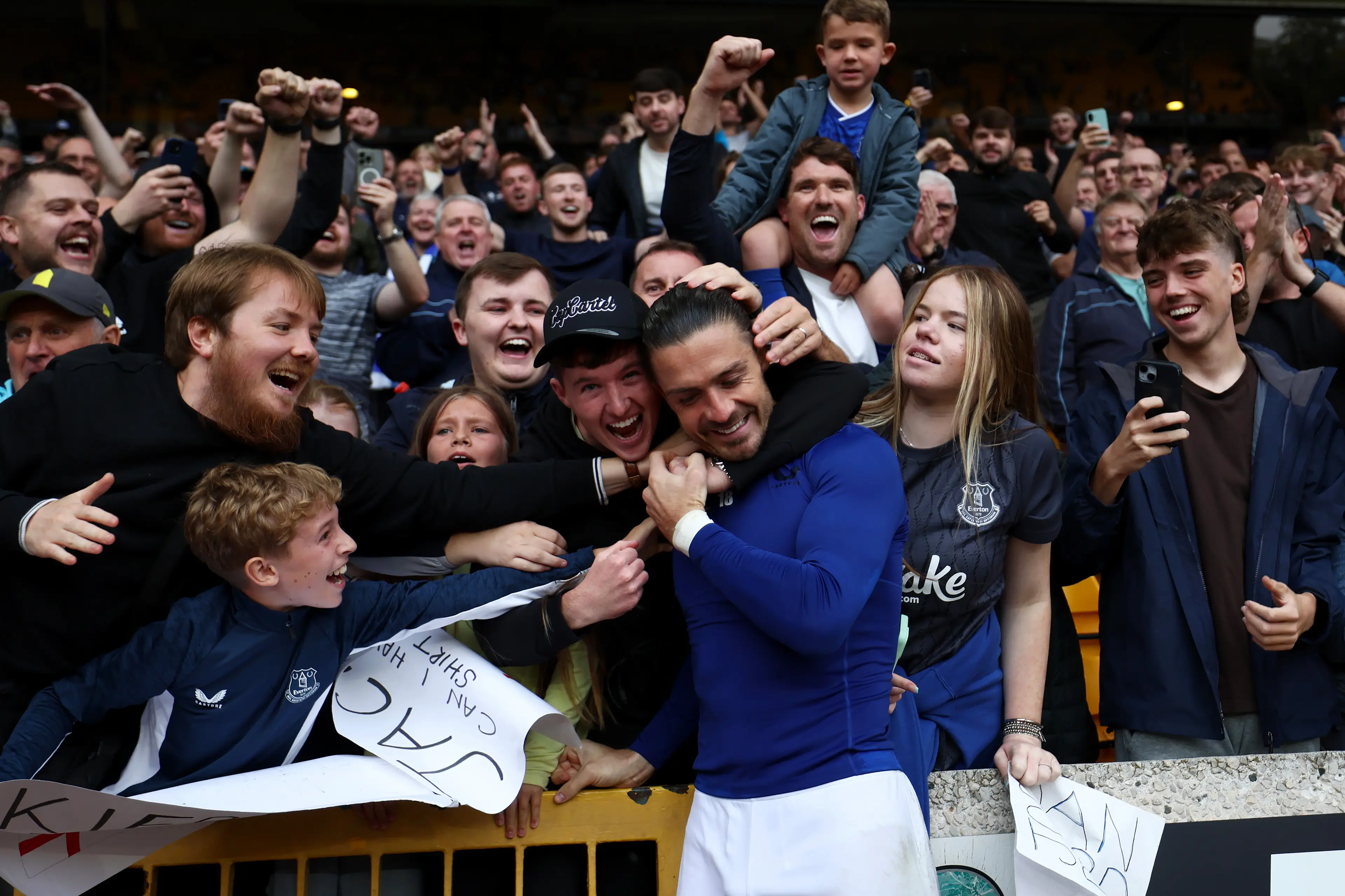 Jack Grealish embraces Everton fans (Image: Getty)