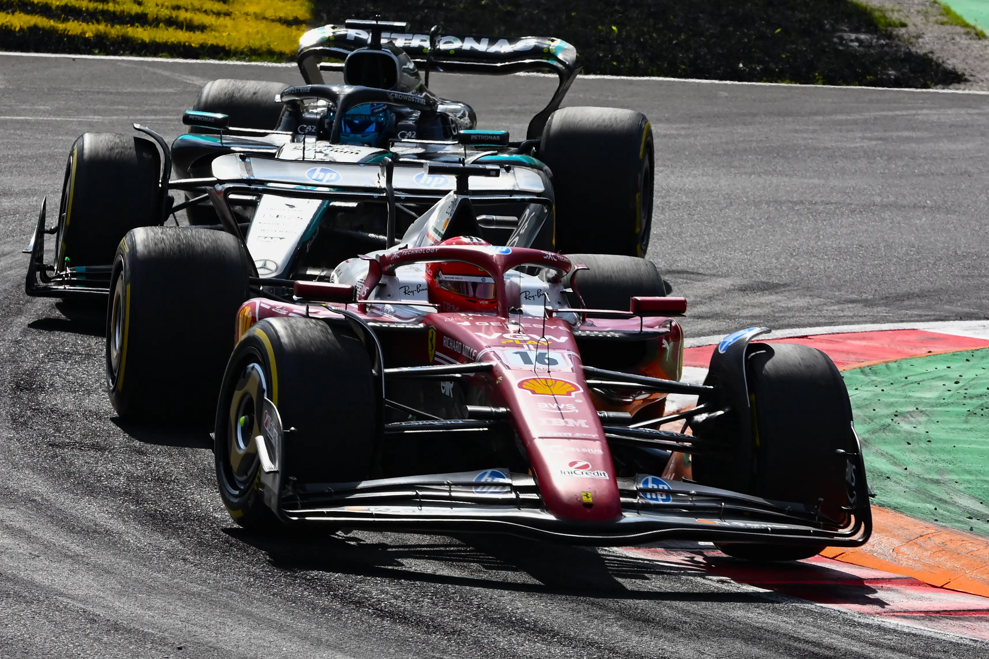 Charles Leclerc leading George Russell at the Italian Grand Prix (credit: getty)
