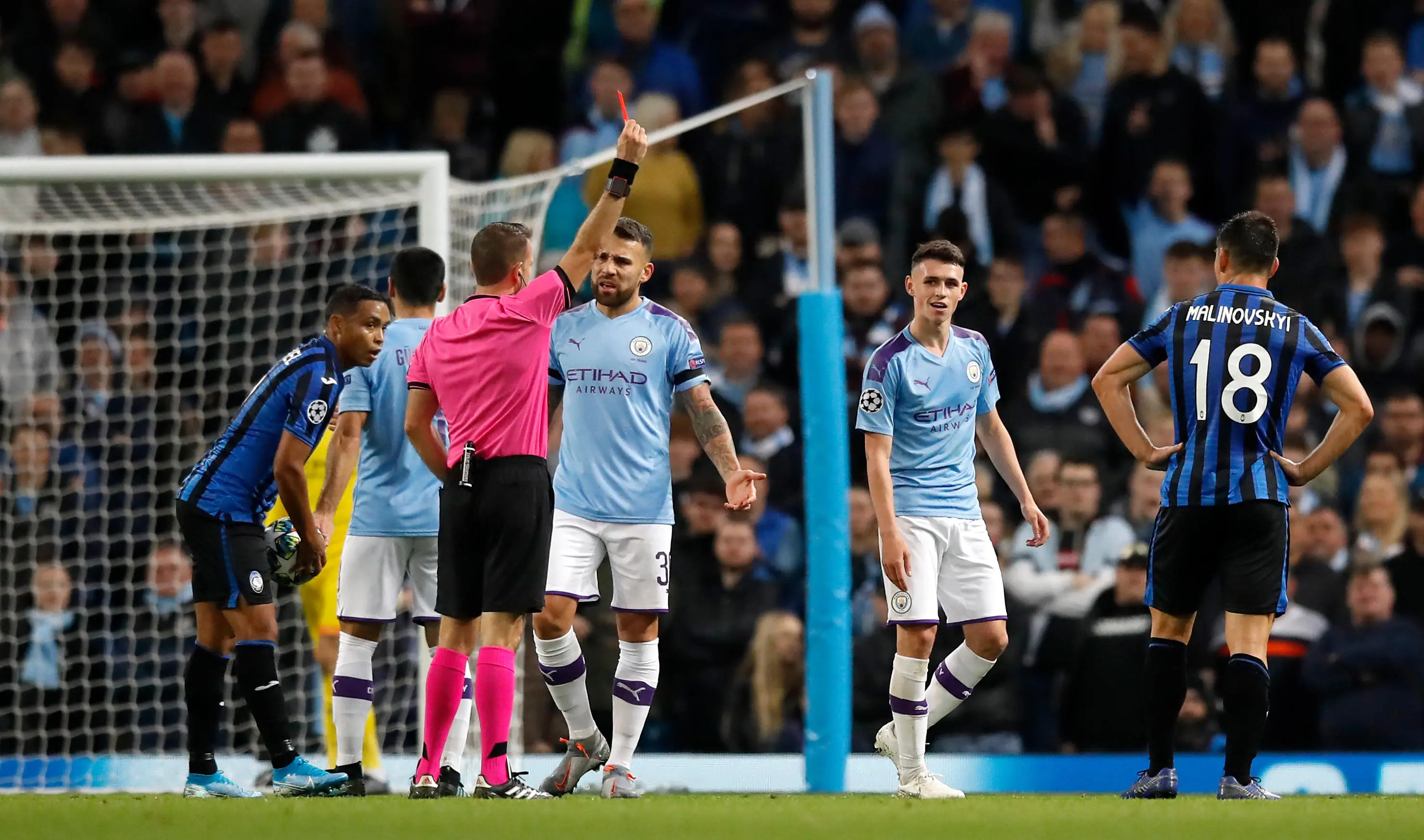 Manchester City's Phil Foden is sent off by referee Orel Grinfeld (Image: PA Images/Alamy)