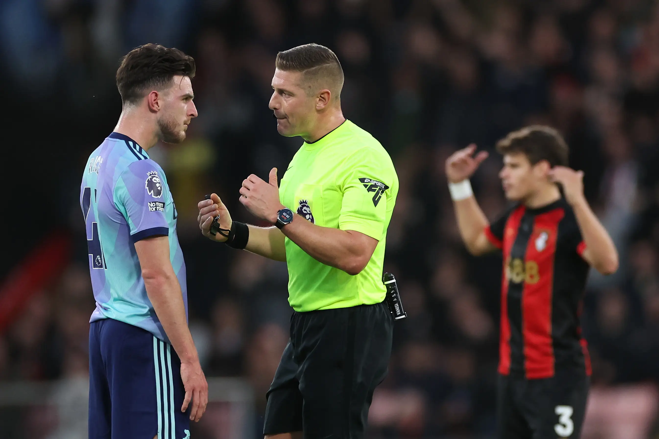Arsenal's Declan Rice and referee Robert Jones. (