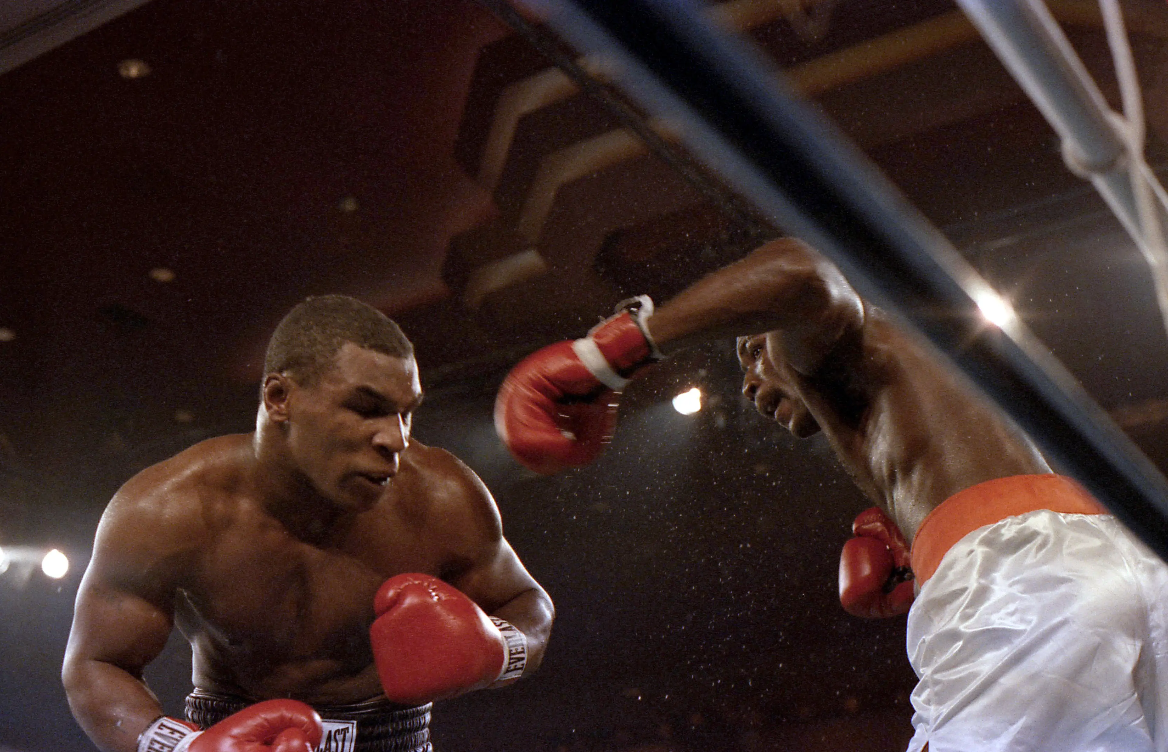 Mike Tyson (L) moves against Jose Ribalta during a bout at Trump Plaza Hotel on August 17, 1986 in Atlantic City, New Jersey. Image credit: Getty 