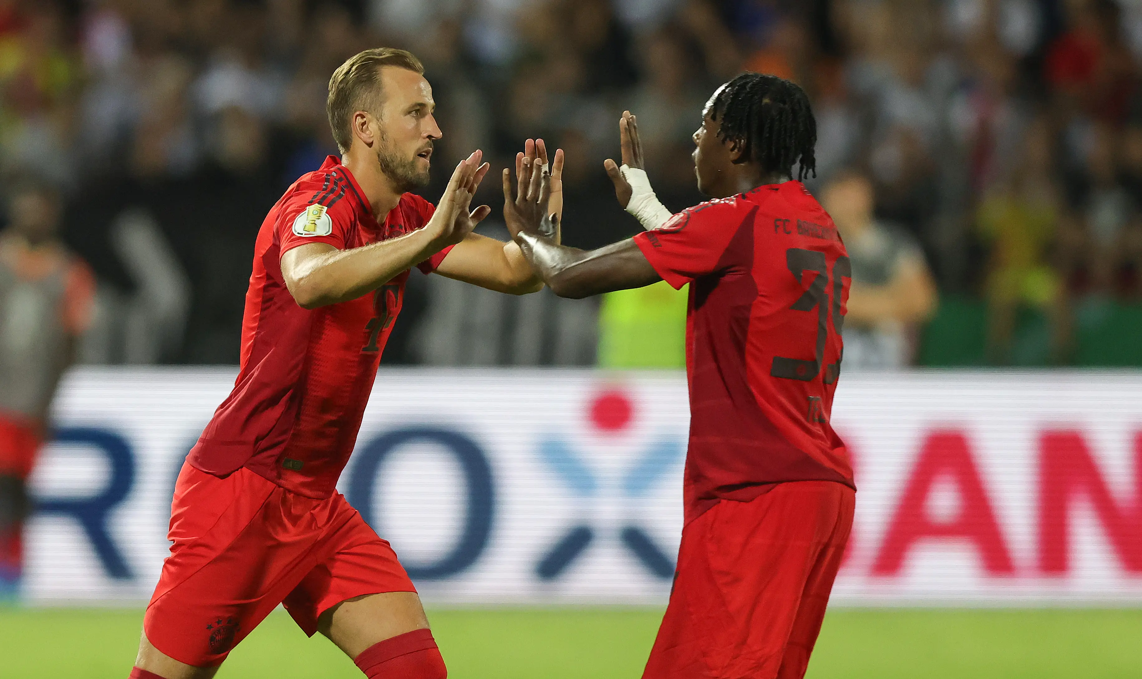 Harry Kane spoke glowingly about Spurs to teammate Mathys Tel. Image: Getty