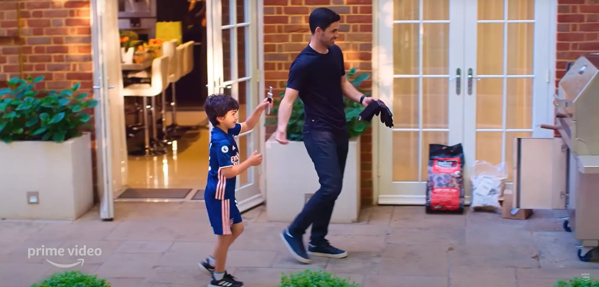 Mikel Arteta with his son.