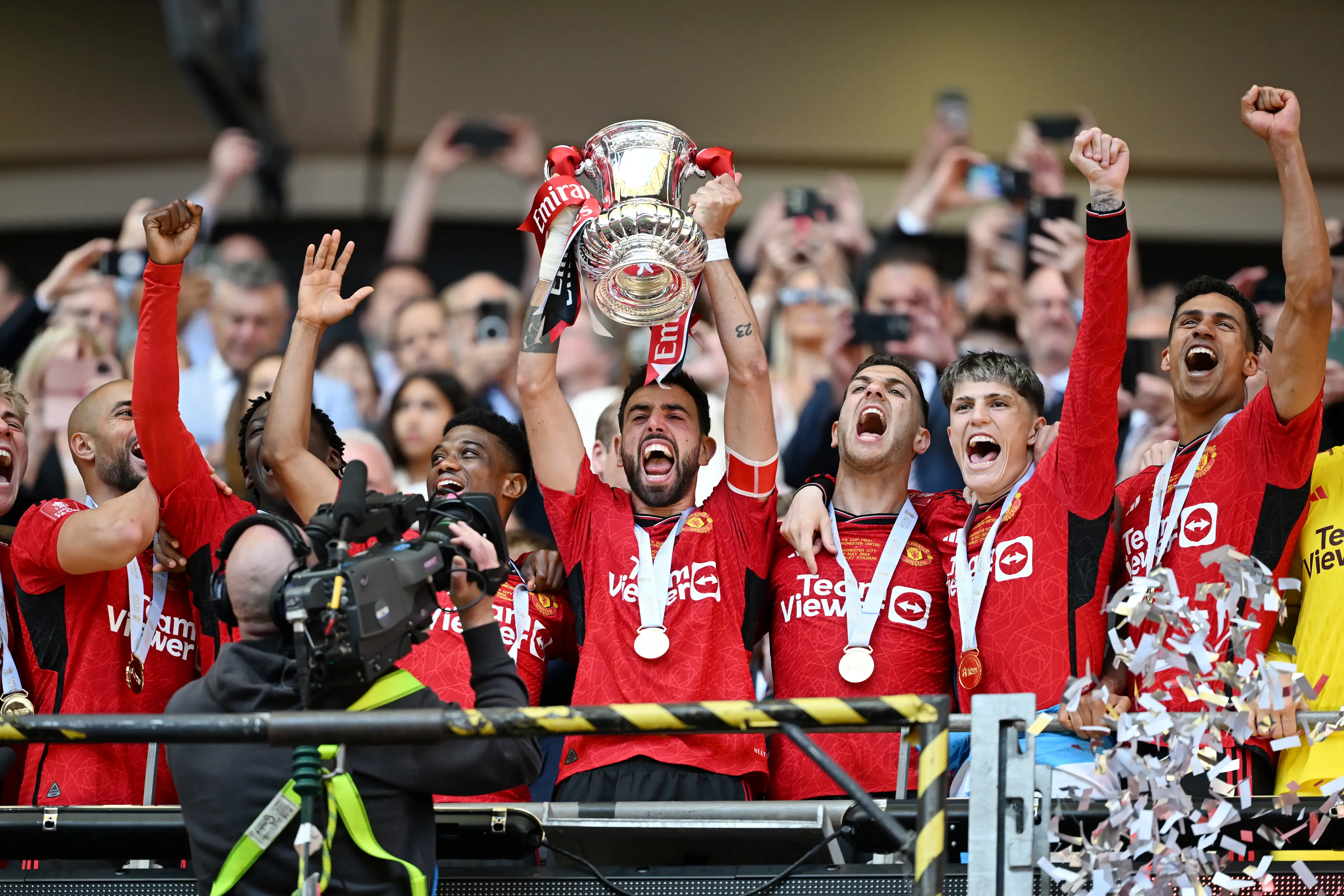 Bruno Fernands holds aloft the FA Cup trophy after Manchester United's victory. Image: Getty 