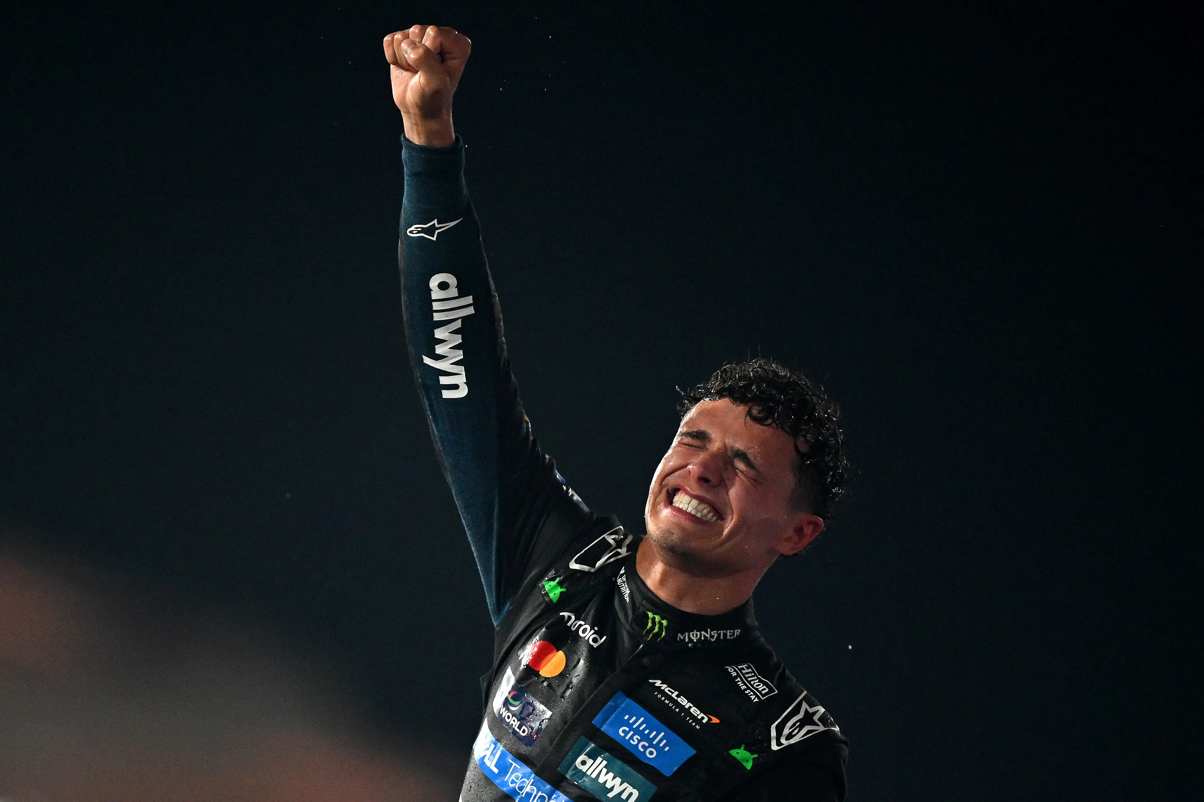 Lando Norris celebrates winning the world title (Image: Getty)