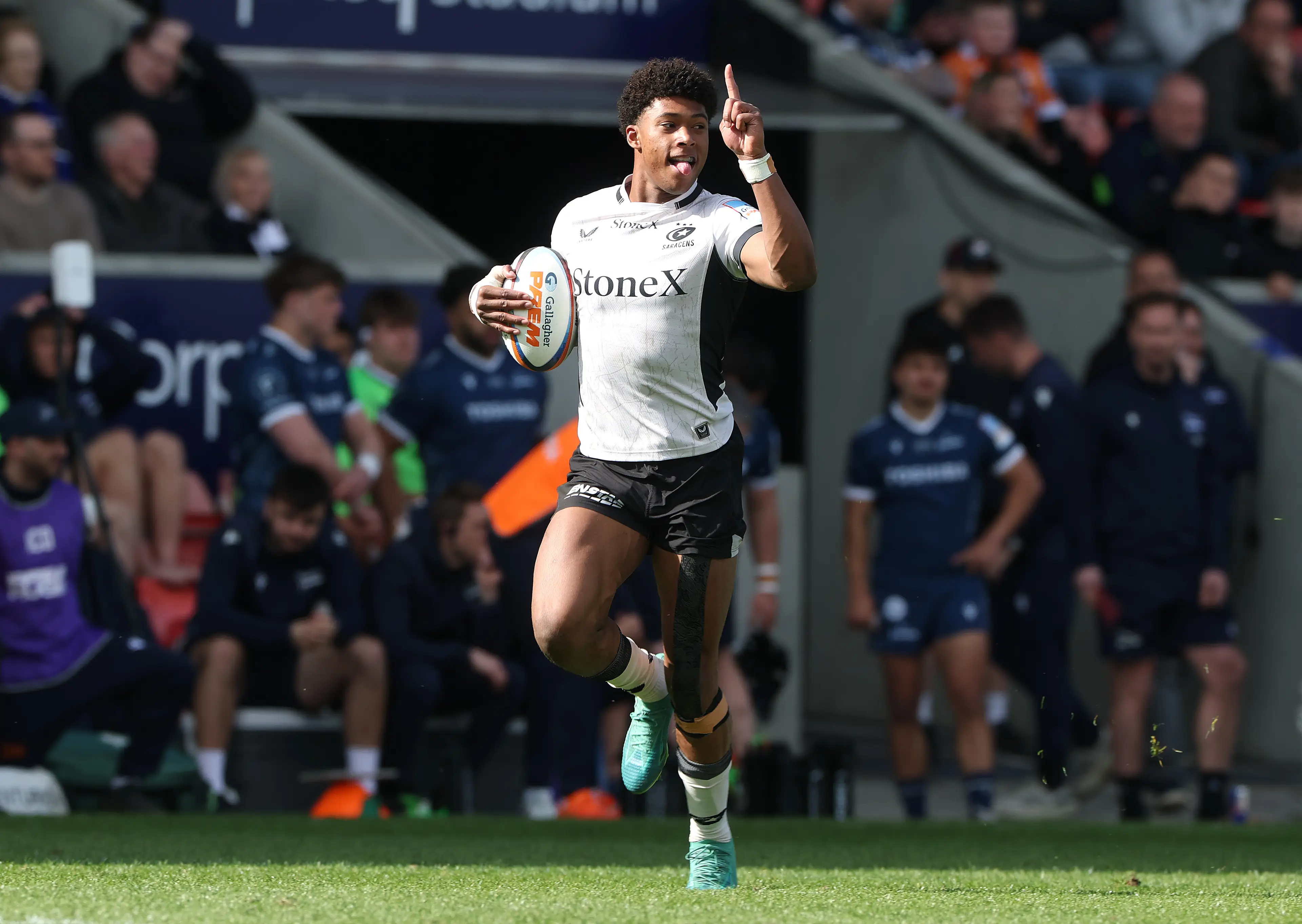 Noah Caluori of Saracens celebrates as he breaks clear to score his third and Saracen's eight try during the Gallagher PREM match between Sale Sharks and Saracens (Getty Images)