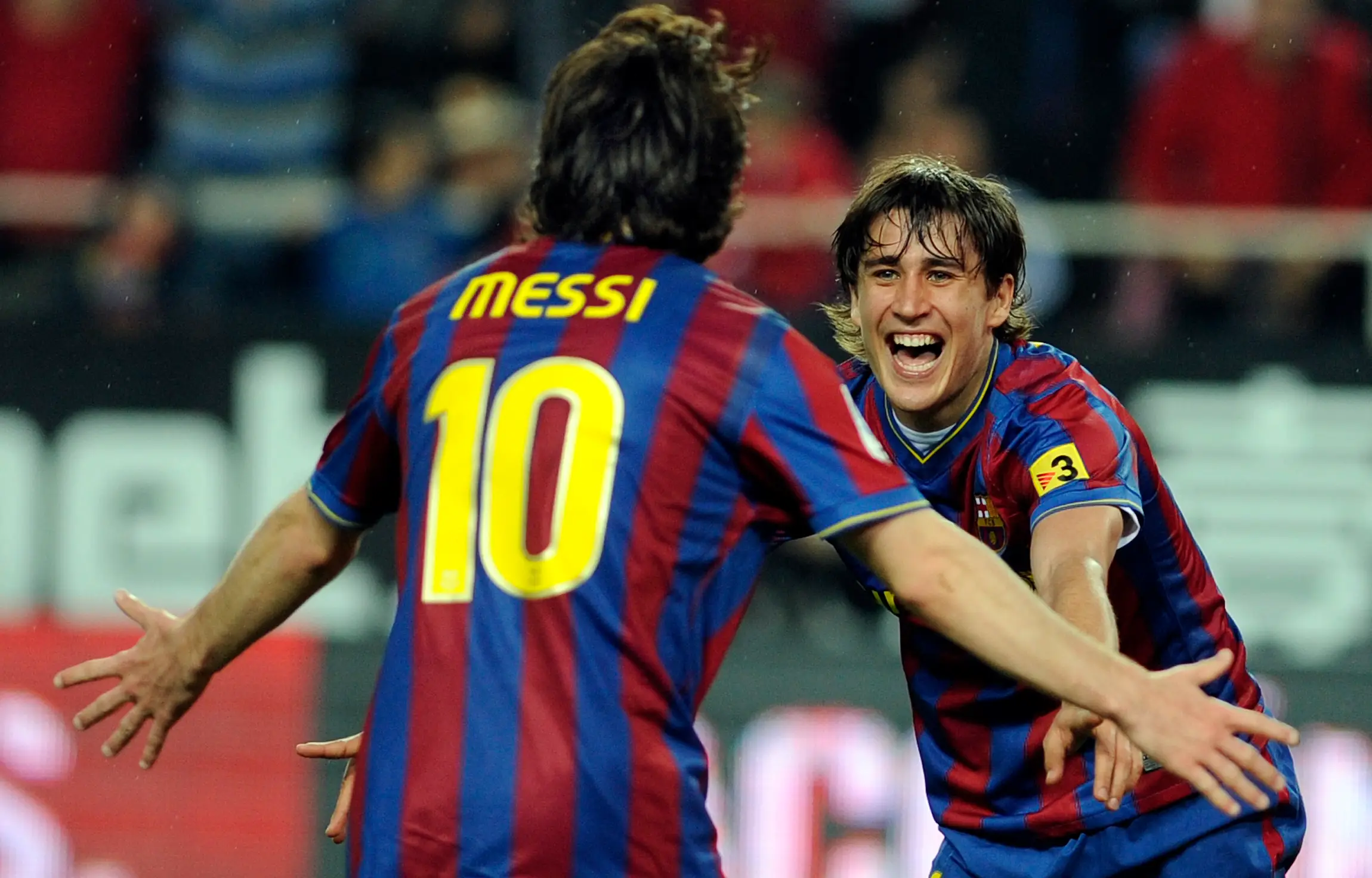Lionel Messi and Bojan Krkic celebrate at Barcelona in 2010 (Image: Getty)