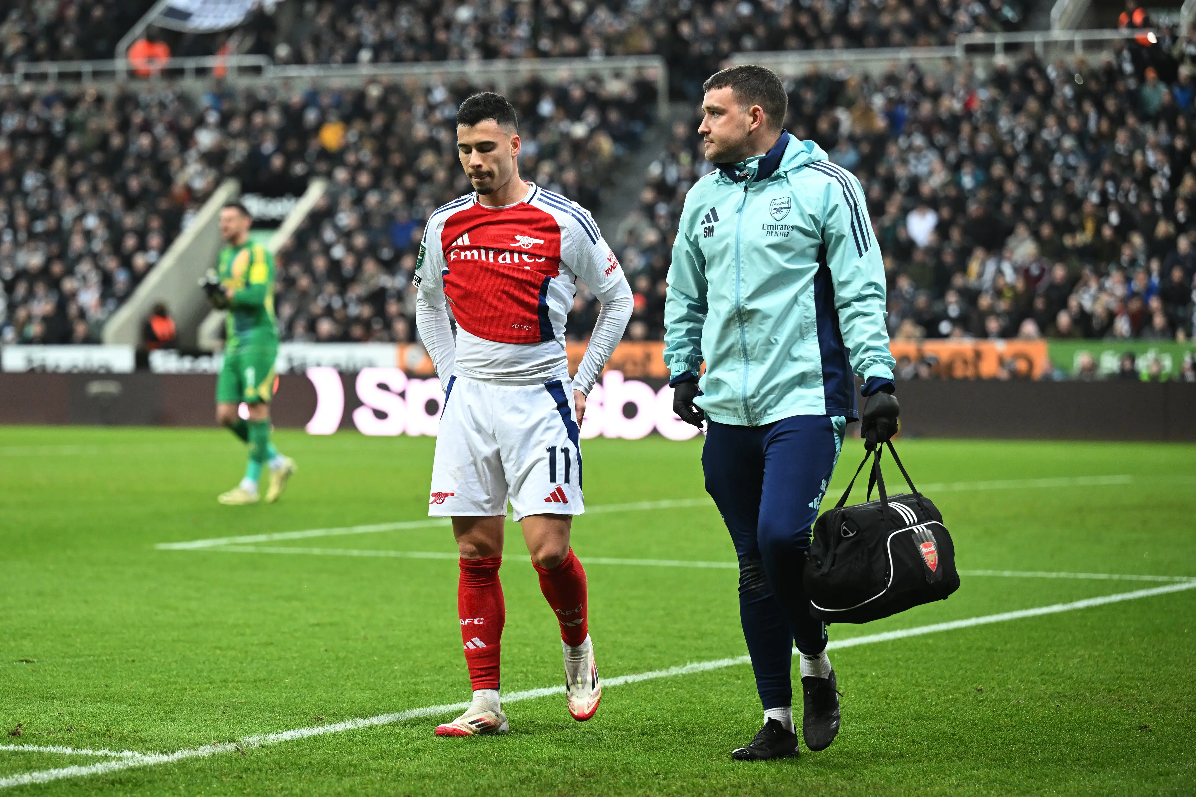 Gabriel Martinelli was forced off during Arsenal's defeat against Newcastle United. Image: Getty