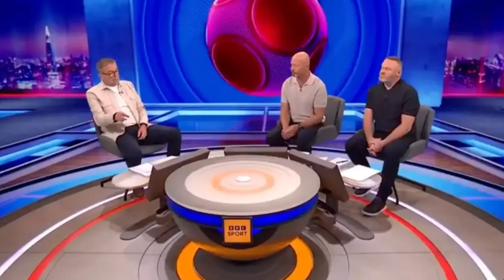 Mark Chapman presenting Match of the Day alongside pundits Alan Shearer and Wayne Rooney (Image: BBC)