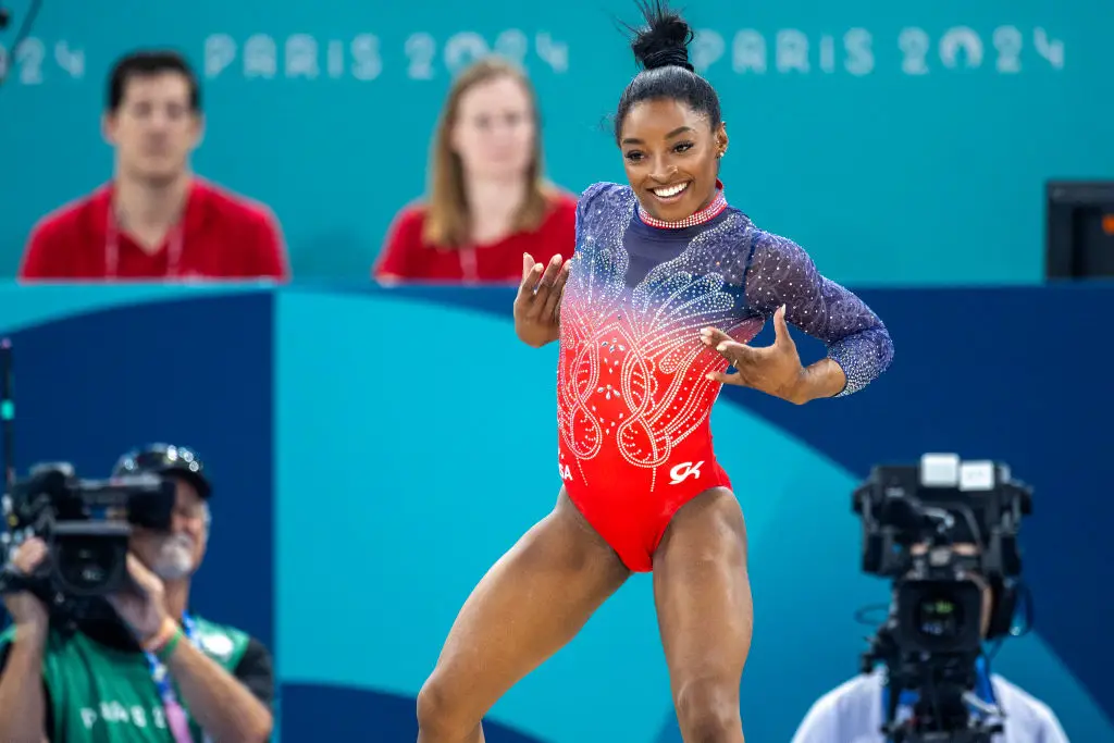Simone Biles is widely regarded as one of the best Olympic athletes of all time. (Image: Getty)