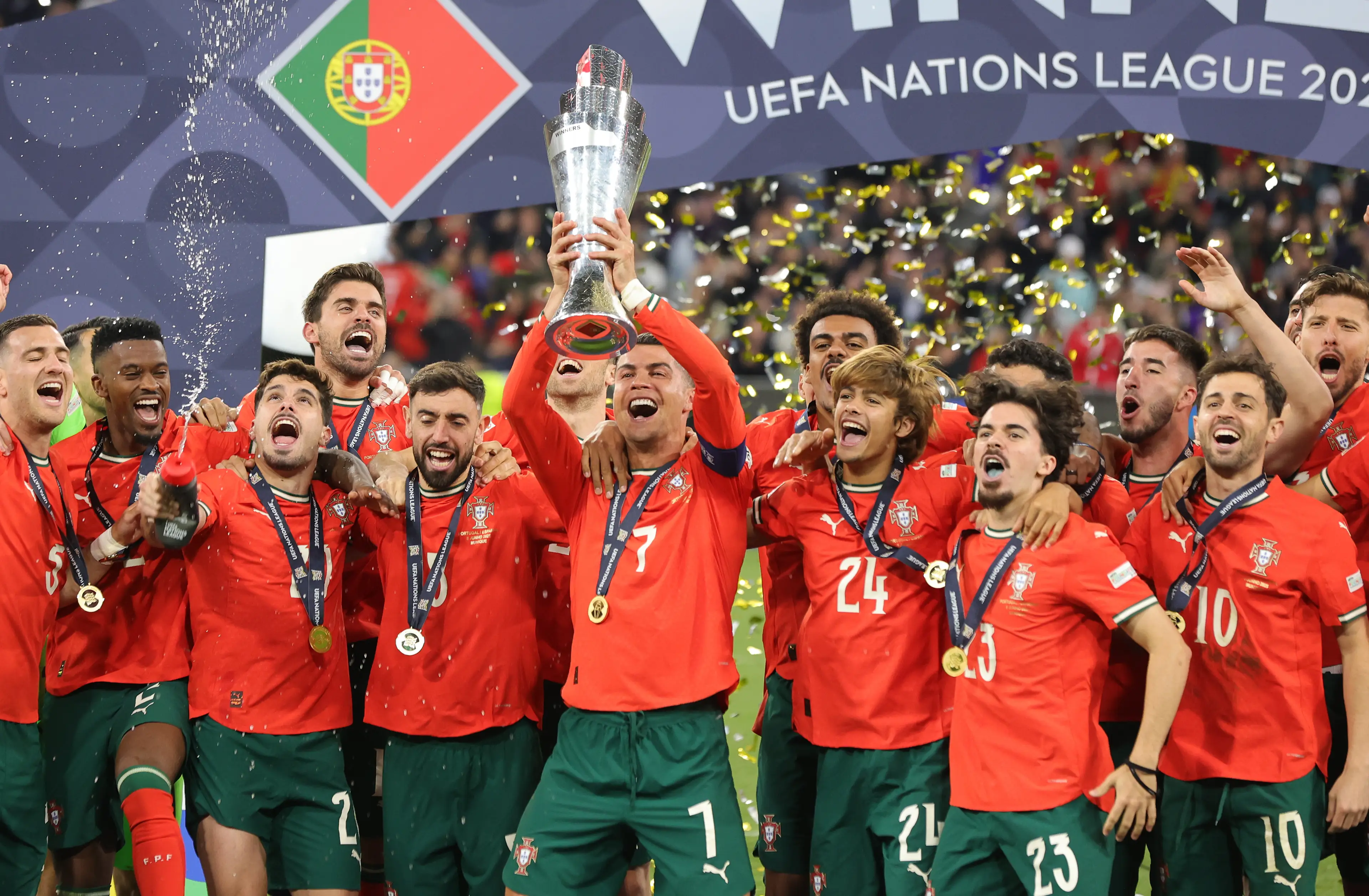 Cristiano Ronaldo holds aloft the Nations League trophy. image: Getty 