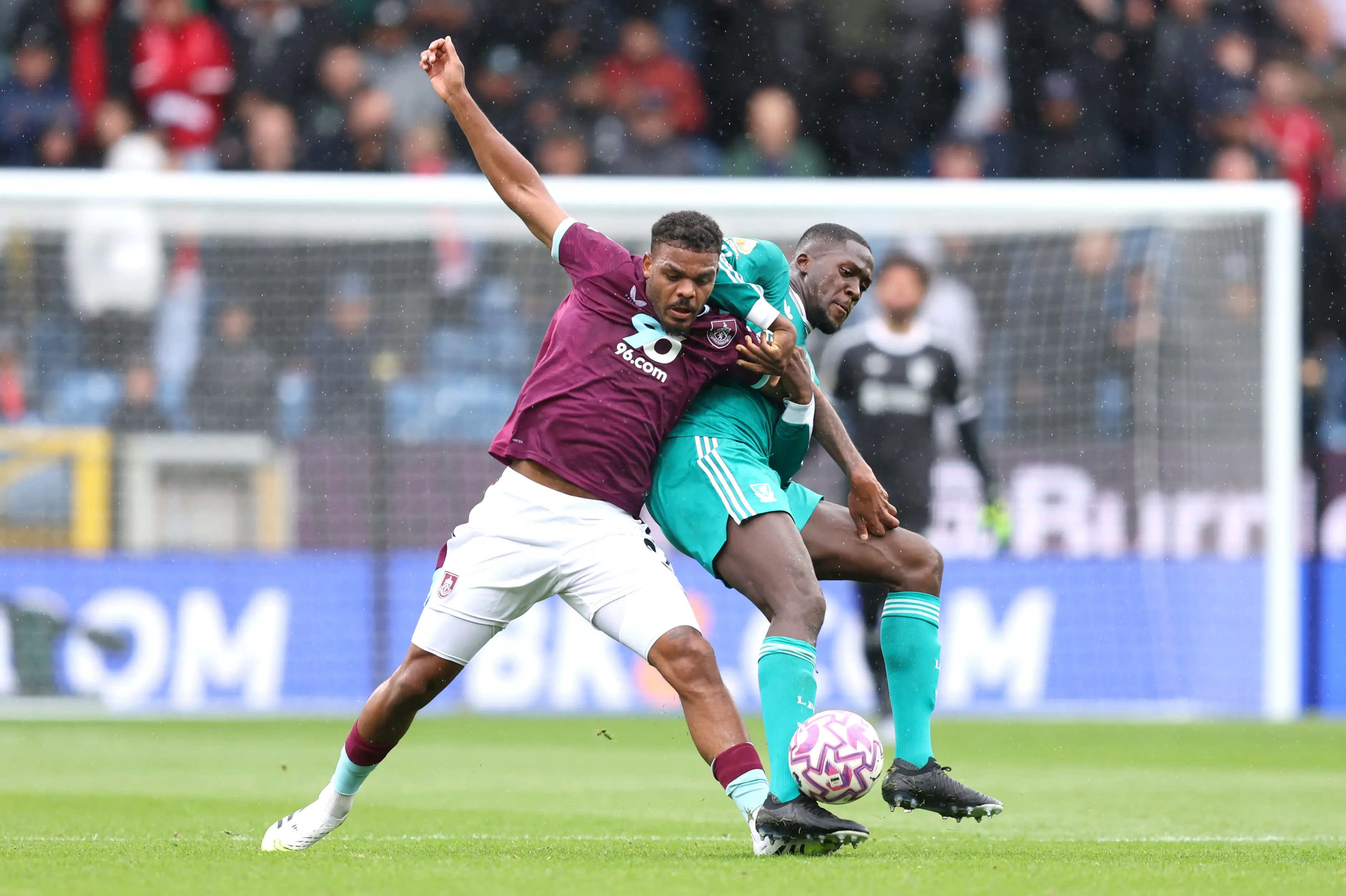 Ibrahima Konate tackling Lyle Foster. Image: Matt McNulty / Stringer via Getty