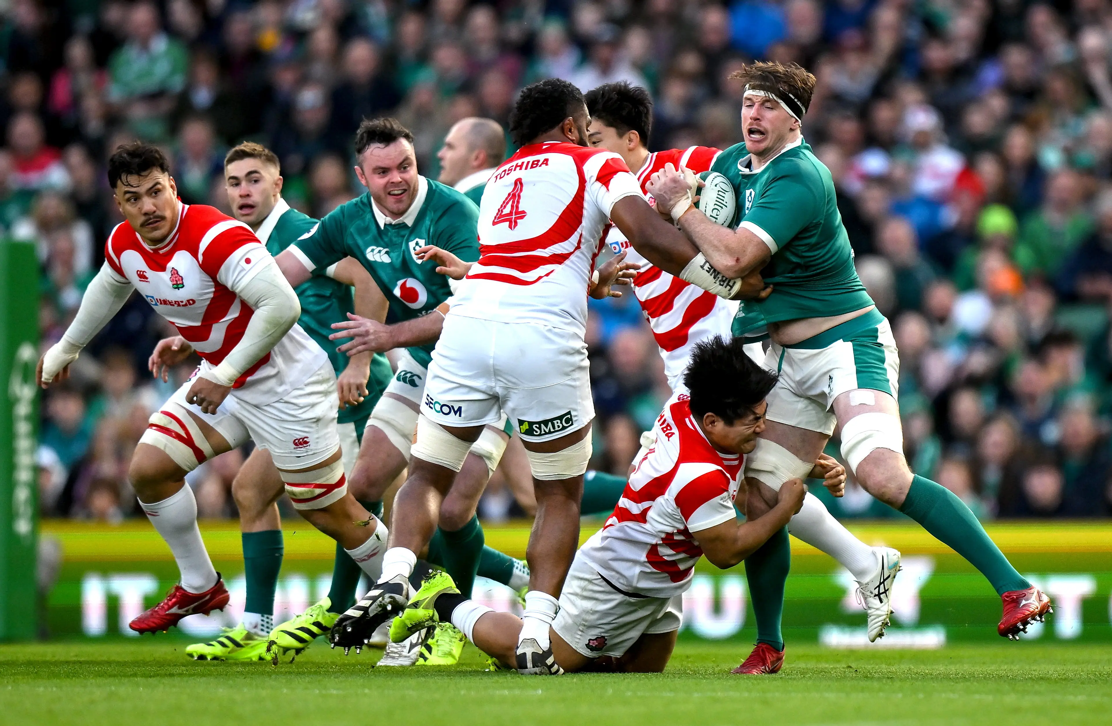 Ryan Baird of Ireland in action against Epineri Uluiviti, 4, and Kenji Sato of Japan (Getty Images)
