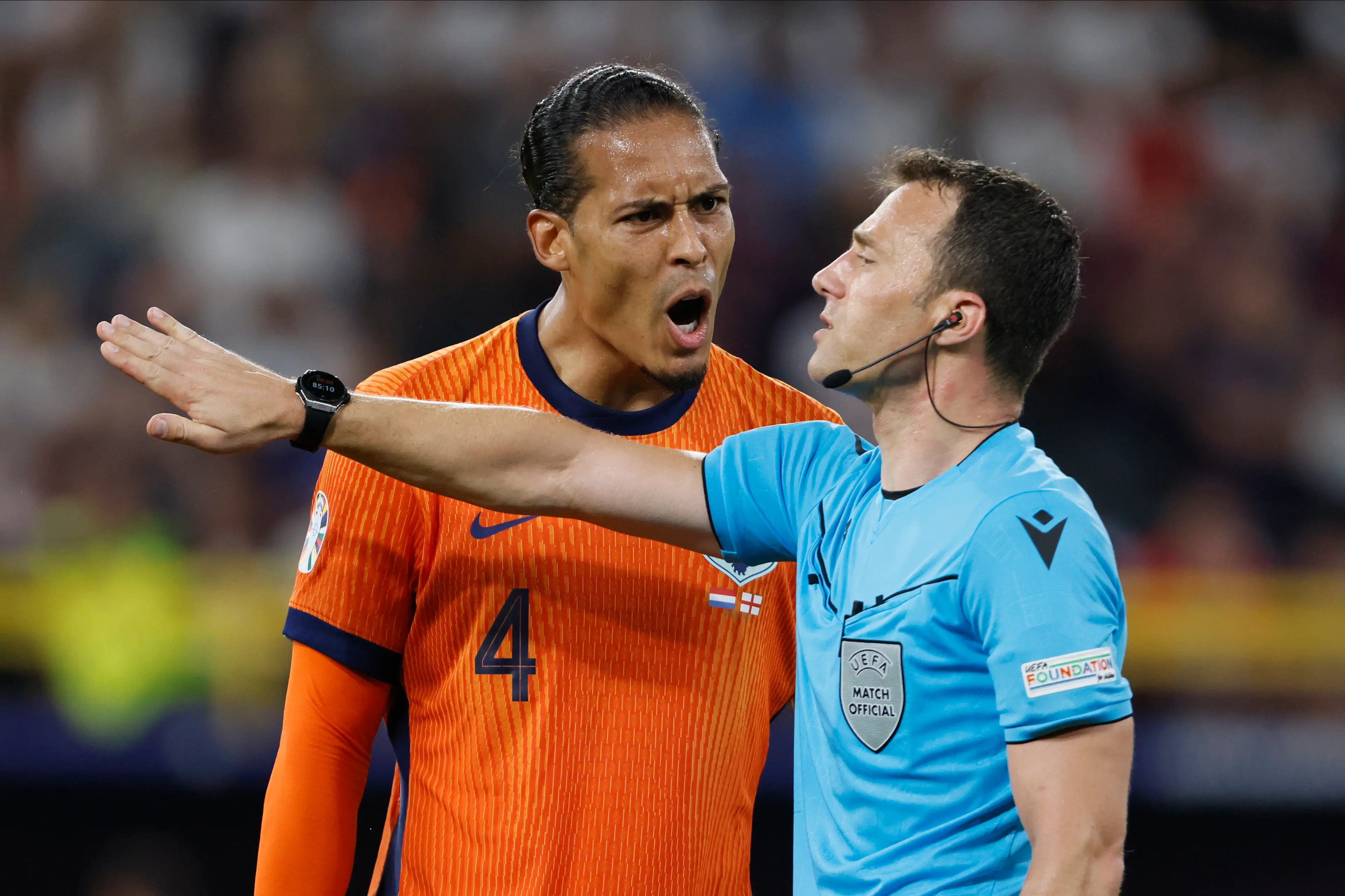Virgil van Dijk shouts at Felix Zwayer. Image: Getty