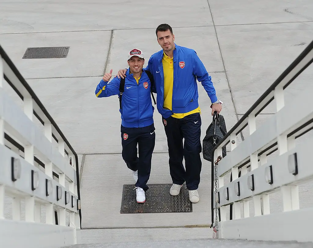 Santi Cazorla and Emiliano Viviano in March 2014 (Credit:Getty)