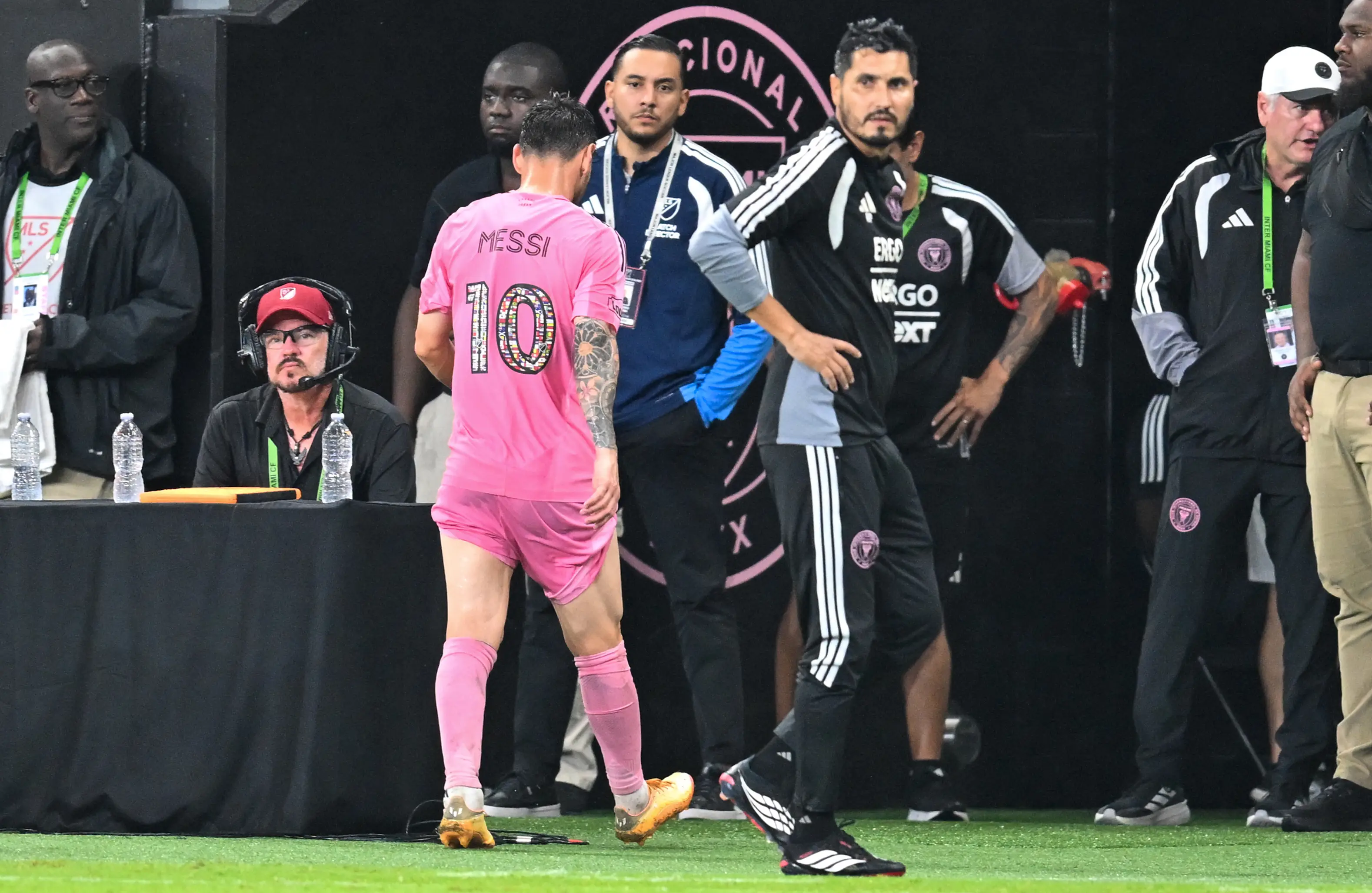 Messi appeared to have some discomfort and held the back of his left leg. Image: Getty