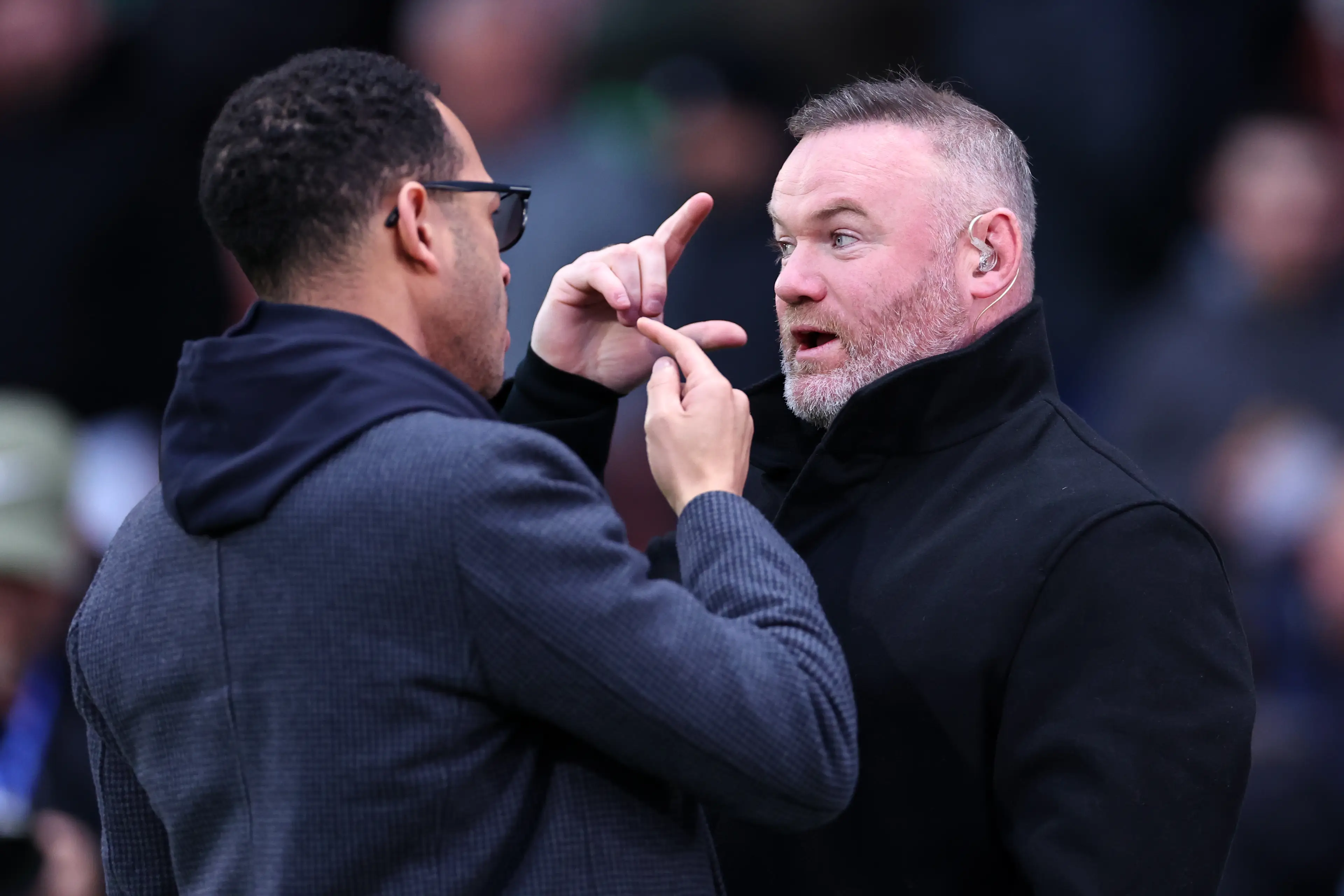 Wayne Rooney speaks to Liam Rosenior before Wrexham vs. Chelsea. Image: Getty 
