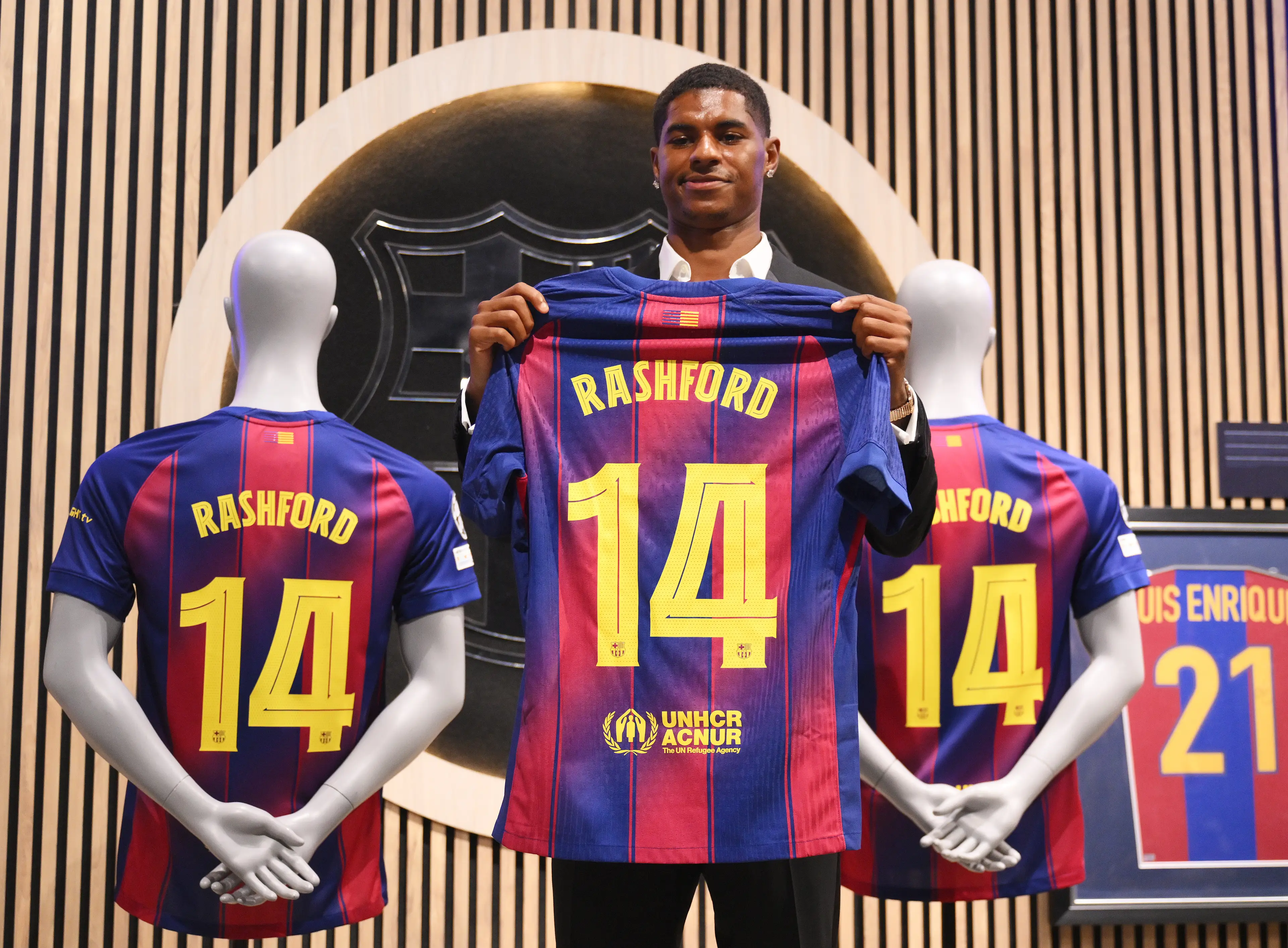 Marcus Rashford and his new number 14 shirt. Image credit: Getty