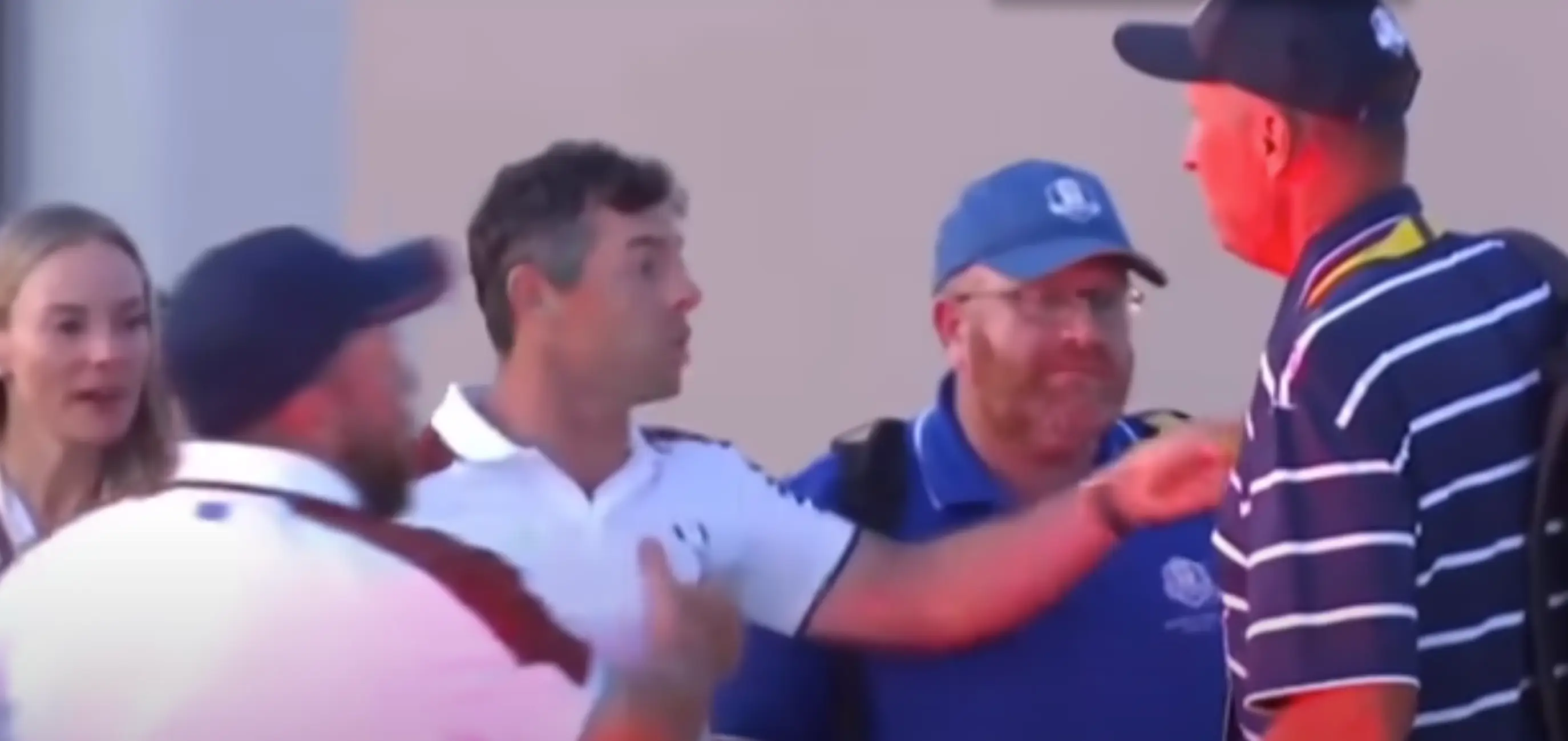 McIlroy had to be pulled back by Lowry after the car park confrontation (Image: Sky Sports)