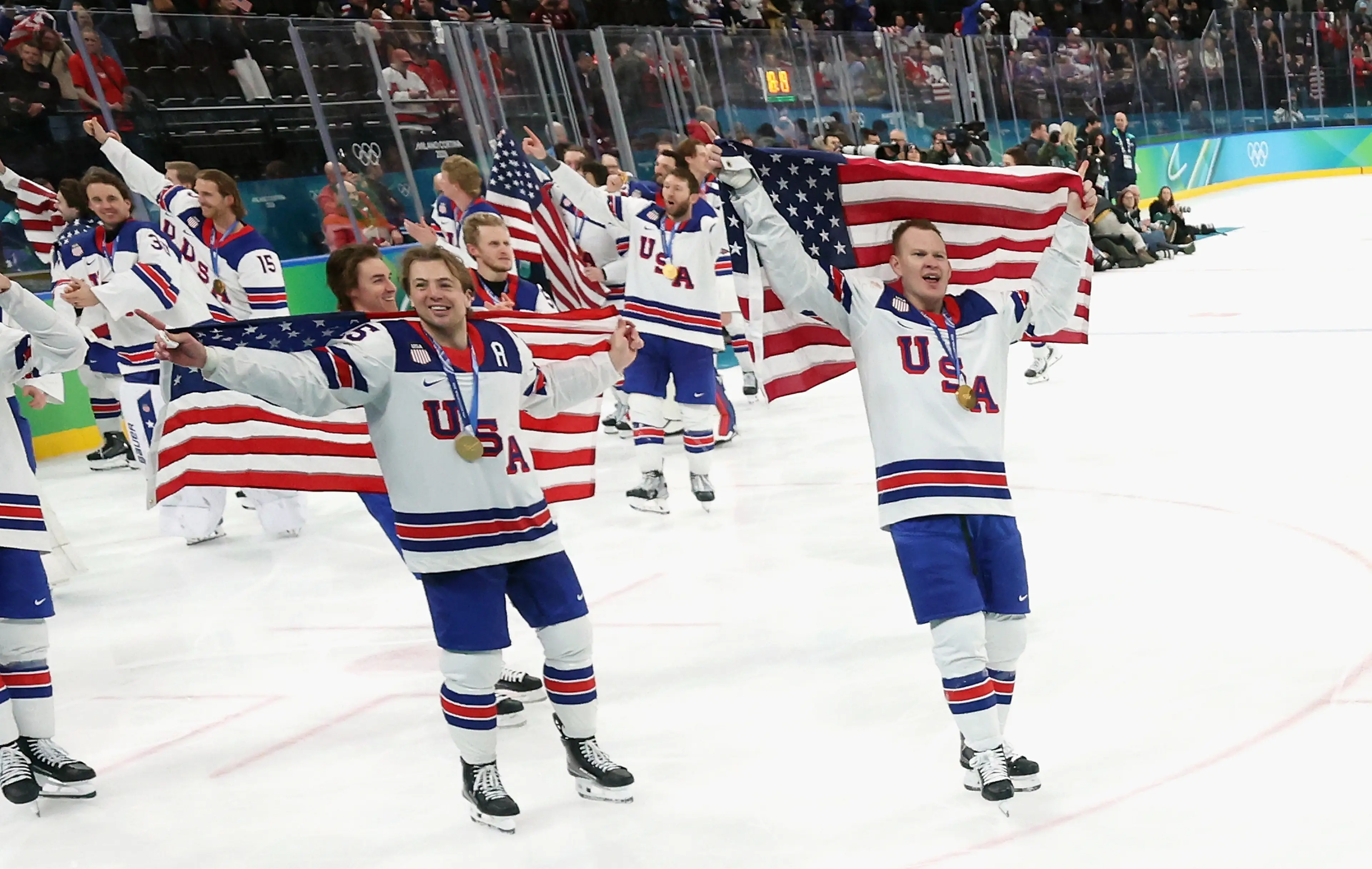 Team USA celebrate winning gold at the Winter Olympics. Image: Getty 